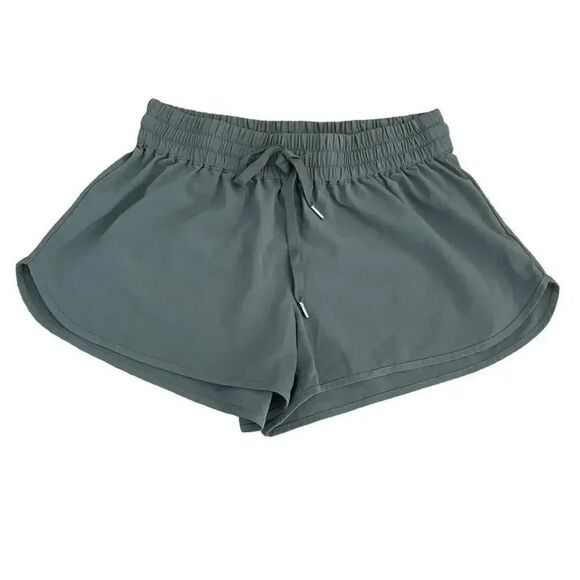 TNA Revolve Olive Green Elastic Waist Sporty Running Mid-Riser’ Shorts SZ XS - Picture 1 of 7